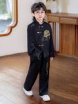 boys gold embroidered chinese jacket standing 3.jpg