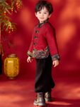 boys tang jacket chinese new year outfit holding decoration.jpg
