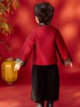 boys tang jacket chinese new year outfit holding decoration.jpg