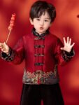 boys tang jacket chinese new year outfit holding decoration.jpg