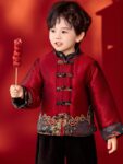 boys tang jacket chinese new year outfit holding decoration.jpg