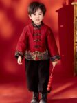boys tang jacket chinese new year outfit holding decoration.jpg