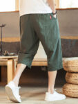 hmnskd116 tang suit black side walking.jpg