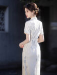 ic1006 qipao white full body outdoor.jpg
