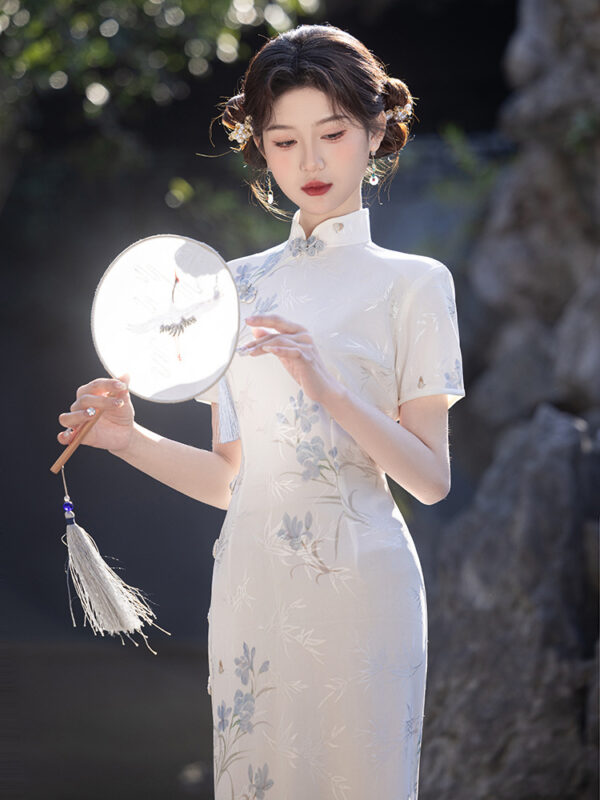 ic1006 qipao white front fan close.jpg