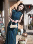 ic1008 qipao blue front street standing.jpg