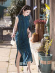 ic1008 qipao blue front street standing.jpg