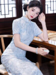 ic1025 qipao blue front standing room.jpg