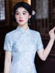 ic1025 qipao blue front standing room.jpg
