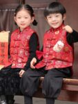 kids chinese quilted vest sitting festive look.jpg