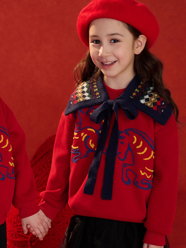 kids festive red sweatshirt close up detail 5.jpg kids festive red sweatshirt close up detail 5.jpg