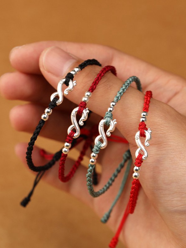 red string bracelets 2.jpg
